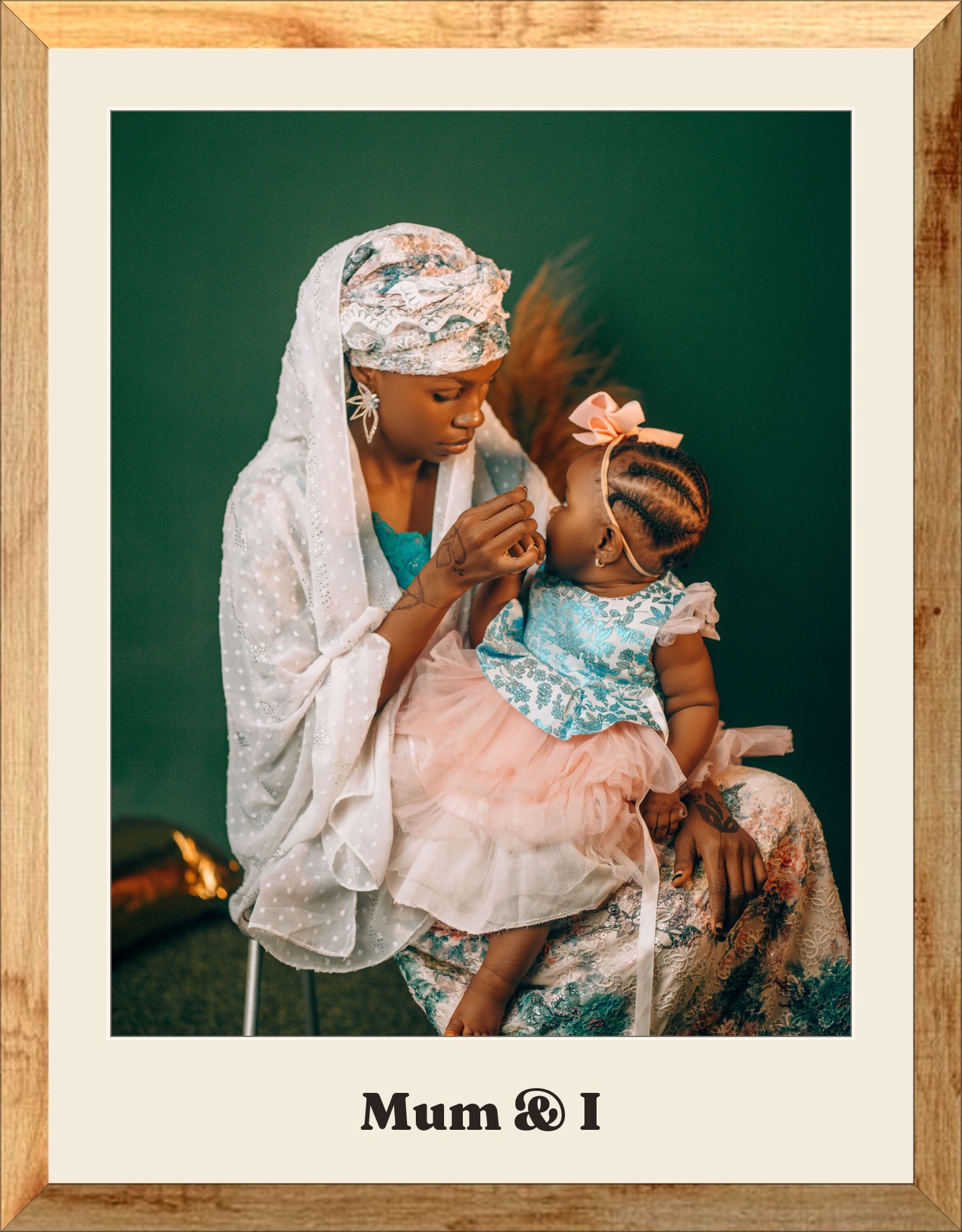 A mother holding her baby, framed